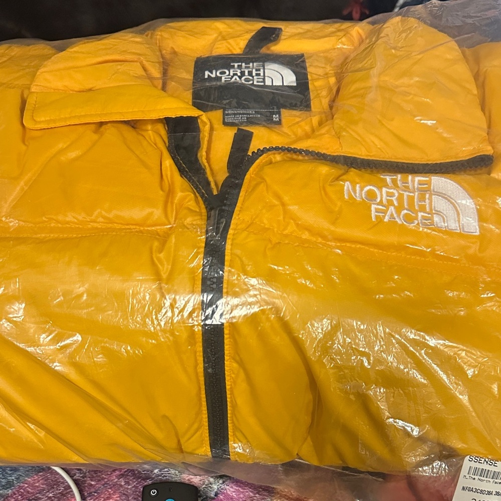 The North Face Yellow Puffer Jacket